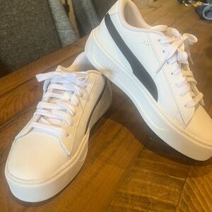 Puma White Sneakers with Black Stripe